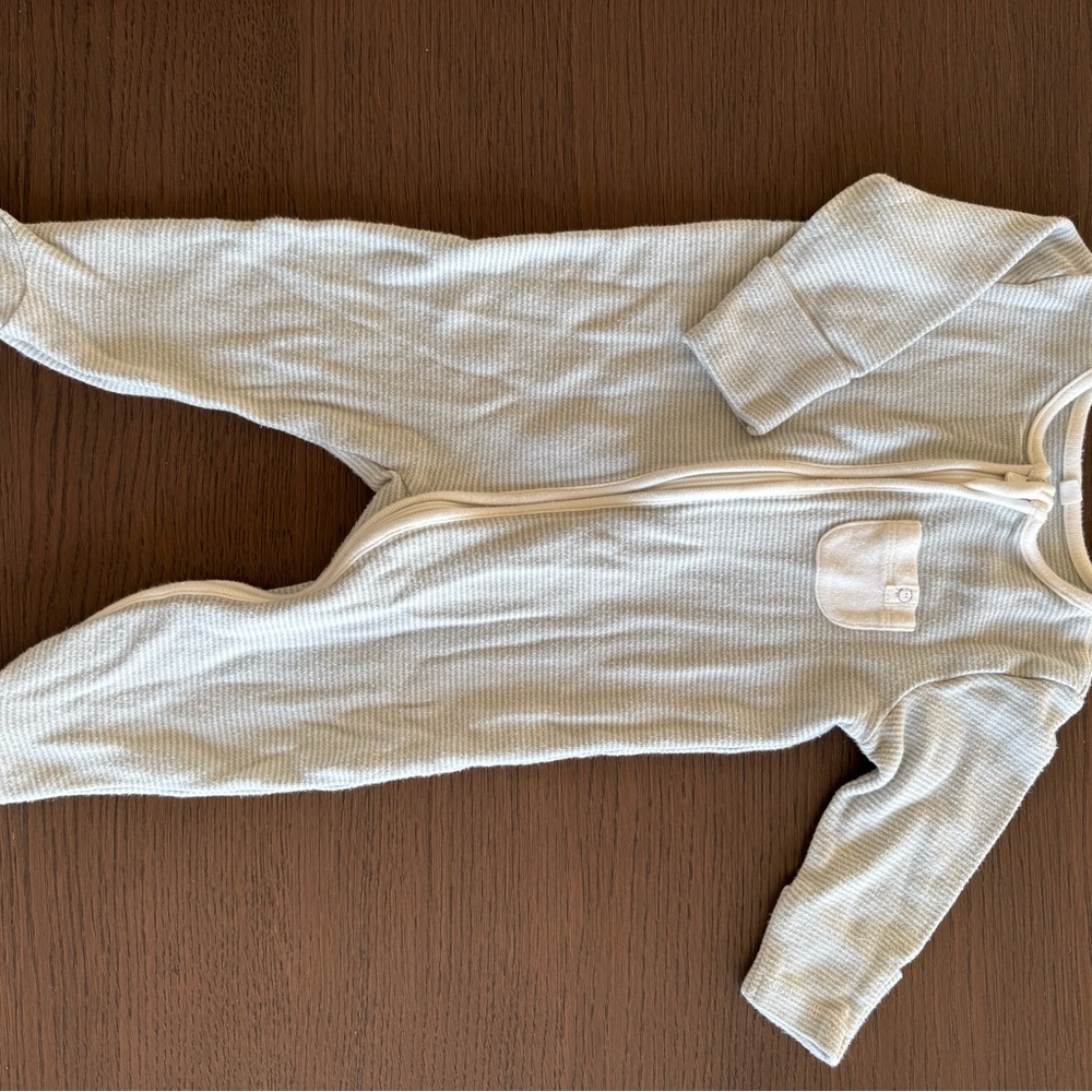 Cream Footies One Piece with Soft Fabric and Zipper Closure